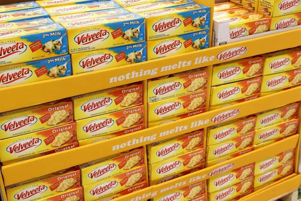 Boxes of Velveeta cheese in a grocery store. How To Freeze & Thaw Velveeta Cheese Correctly