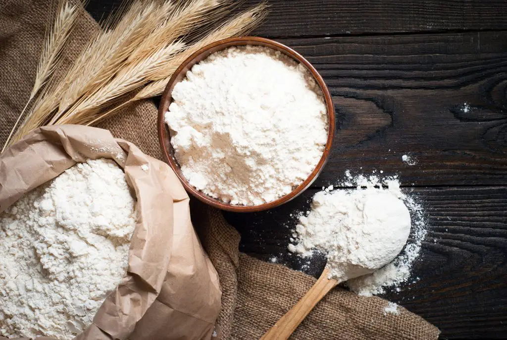 Bag and container of fresh flour.