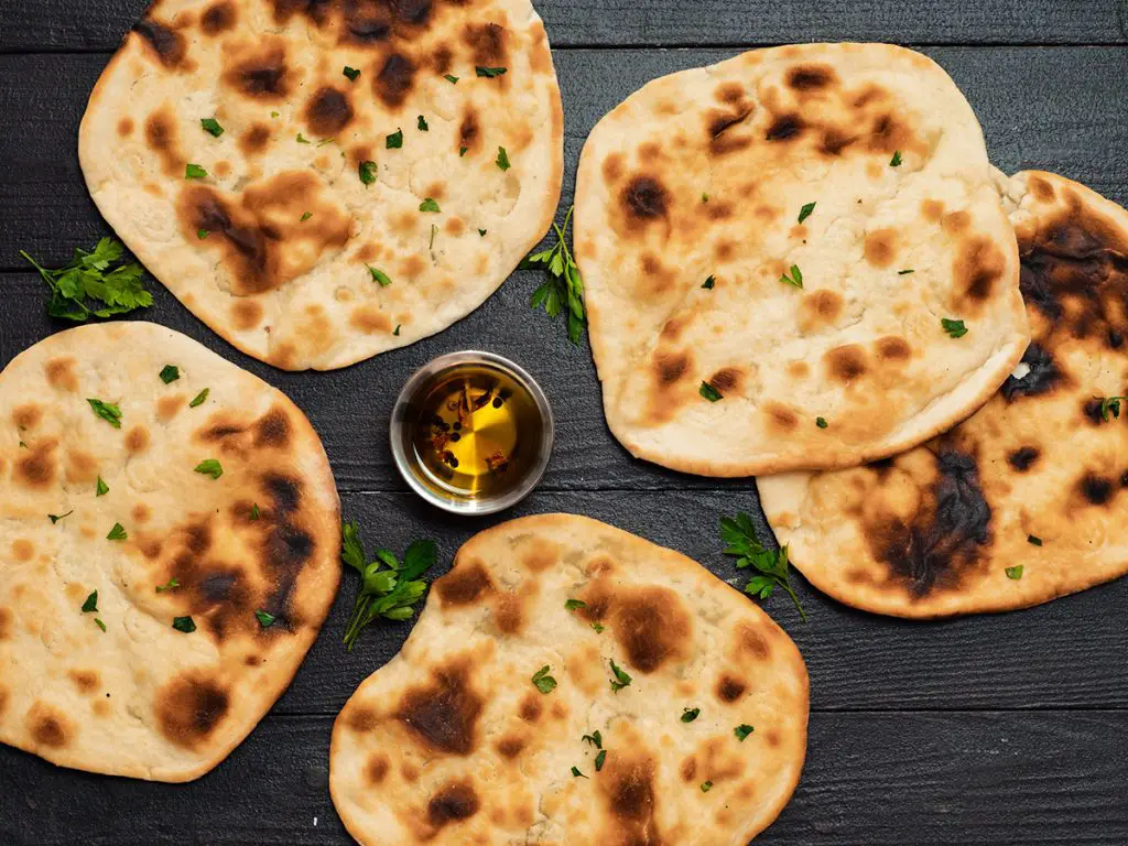 Reheating your naan bread with butter or ghee is yummy.