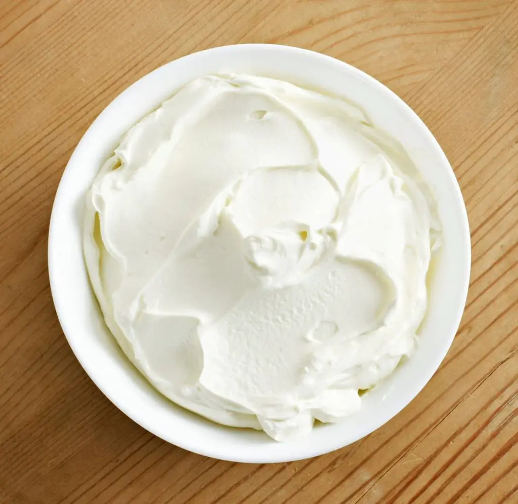 Bowl of whipped cream cheese ready to freeze