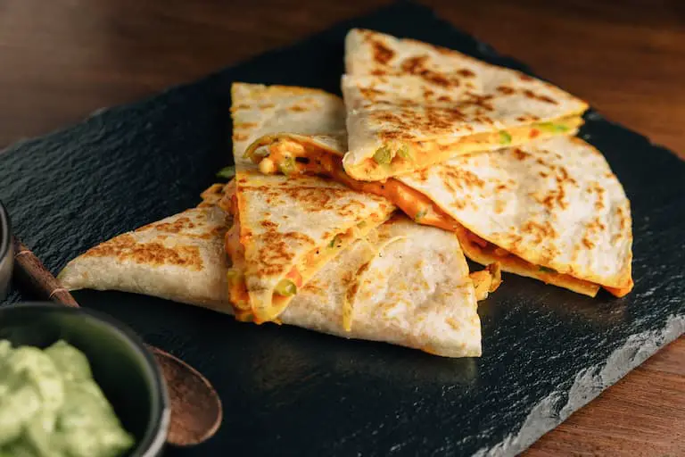 Cooked quesadillas can be frozen