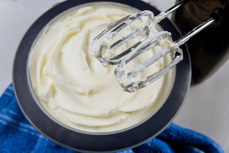Whipping cream cheese in a bowl