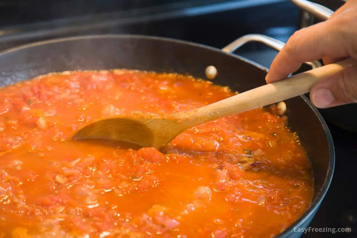 Preparing Homemade Tomato Sauce to freeze